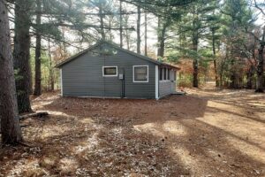 Central WI Wooded Land with Cabin: Perfect Retreat near Castle Rock Lake