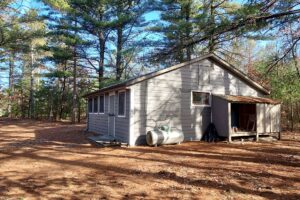 Central WI Wooded Land with Cabin: Perfect Retreat near Castle Rock Lake