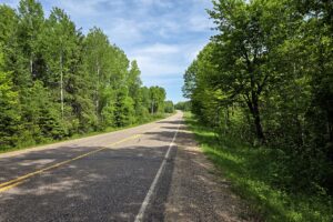 Wooded land for sale with frontage on Somo River in Northern Wisconsin.